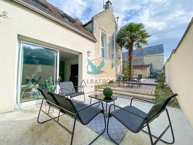 ACHETER - Une maison avec un terrain clos exposé sud à proximité de la mer avec terrasse et place de stationnement, proche Caen, à Saint-Aubin-d'Arquenay, en exclusivité